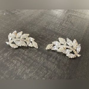 Vintage Clear rhinestones leaf dress clips.